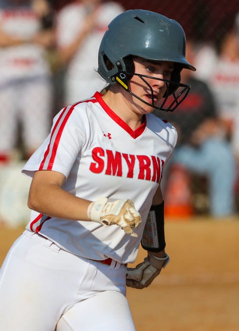 Smyrna's Kennedy Diehl heads for third base on a RBI hit as she plates a run to close the deficit to 6-3 in the fourth inning of Polytech's 8-3 win at Smyrna High School, Thursday, April 18, 2024.