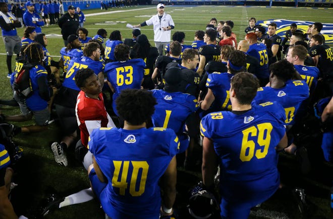 Delaware head coach Ryan Carty addresses his team after the Blue and White Spring Game at Delaware Stadium, Friday, April 19, 2024.