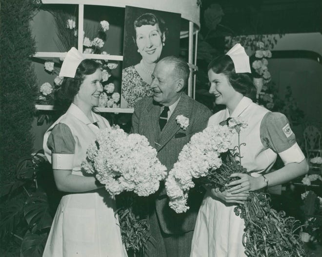 Carnations are gathered for Mamie Eisenhower at the 1953 Philadelphia Flower Show.