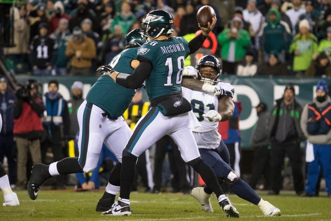 Eagles' Josh McCown (18) throws downfield Sunday night at Lincoln Financial Field. The Seahawks defeated the Eagles ending their season 17-9.