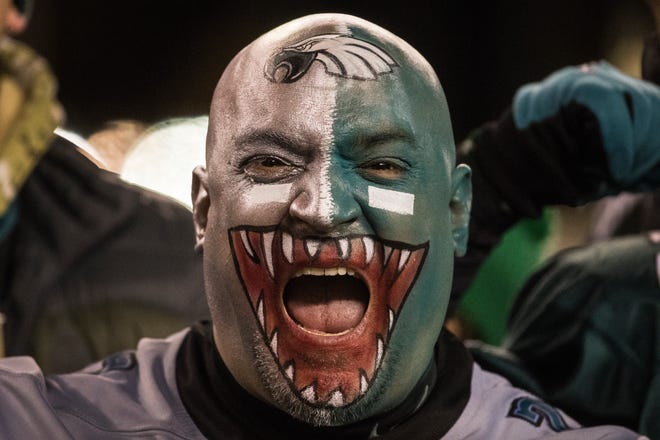 Eagles fans cheer on their team during their NFC Wild Card matchup with the Seattle Seahawks Sunday night at Lincoln Financial Field. The Seahawks defeated the Eagles ending their season 17-9.