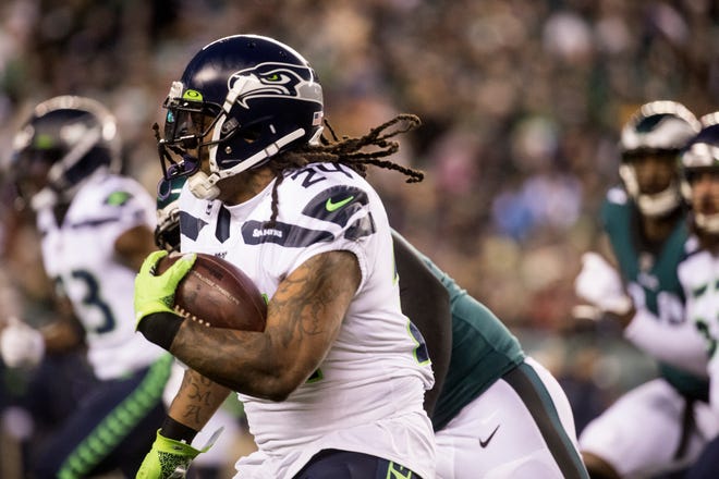 Seattle's Marshawn Lynch (24) rushes downfield Sunday night at Lincoln Financial Field. The Seahawks defeated the Eagles ending their season 17-9.