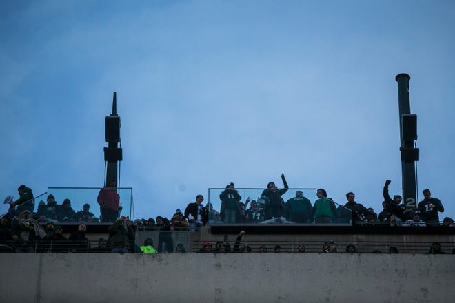 Eagles fans cheer on their team from the top deck of Lincoln Financial Field Sunday afternoon. The Seahawks defeated the Eagles ending their season 17-9.