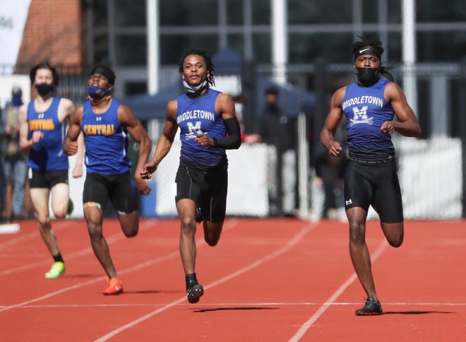 Middletown's Tysean Baronette (right) leads teammate Tyler Green as the pair finish one-two in the 400 meter dash during the DIAA state indoor track and field championships at Dover High School Wednesday, March 3, 2021.