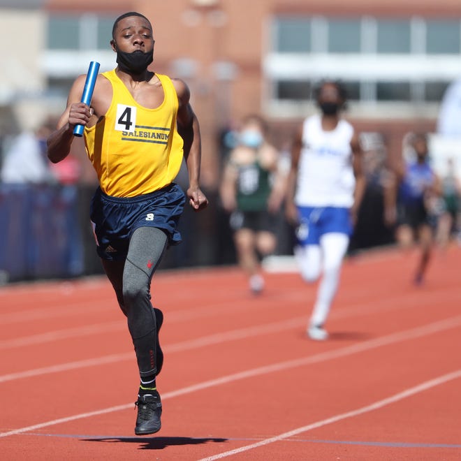 Salesianum's Bishop Lane takes the anchor leg to a first place in the 4x200 meter relay during the DIAA state indoor track and field championships at Dover High School Wednesday, March 3, 2021.